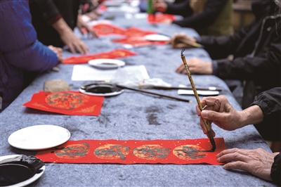 花学文 | 年味融在墨香里-南方文苑网